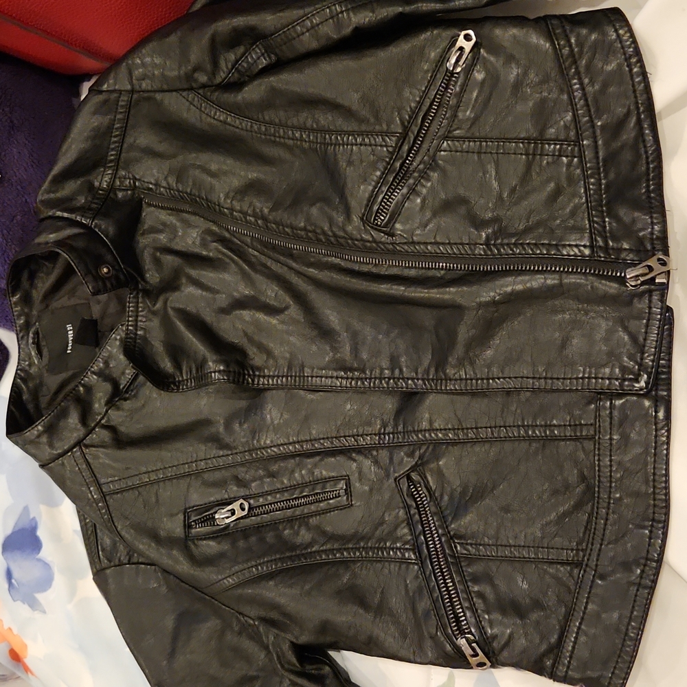 Womens small leather jacket .